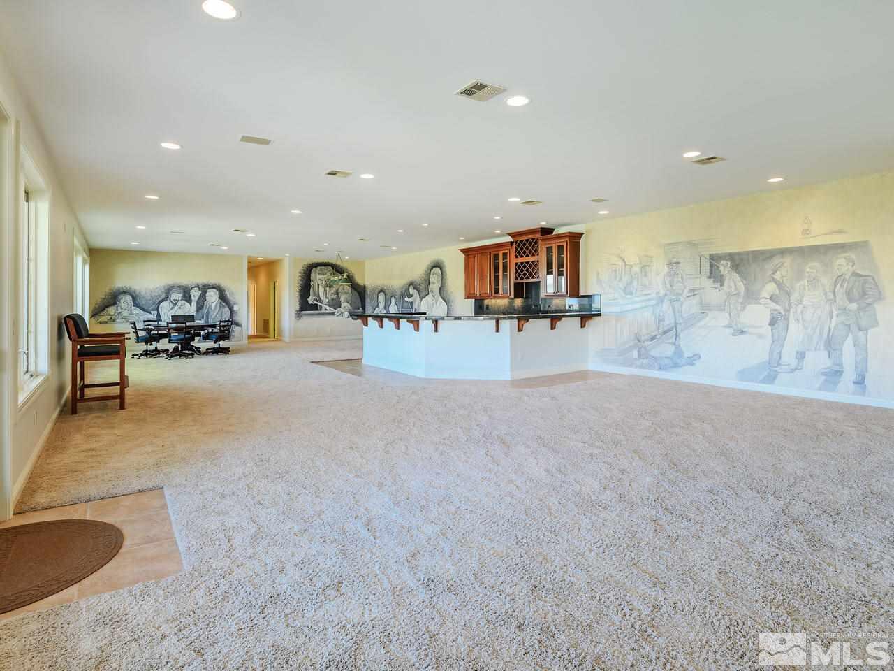 1180 Paddock Lane Reno, NV 89521 - Photo 15 of 25 a living room with furniture and a flat screen tv