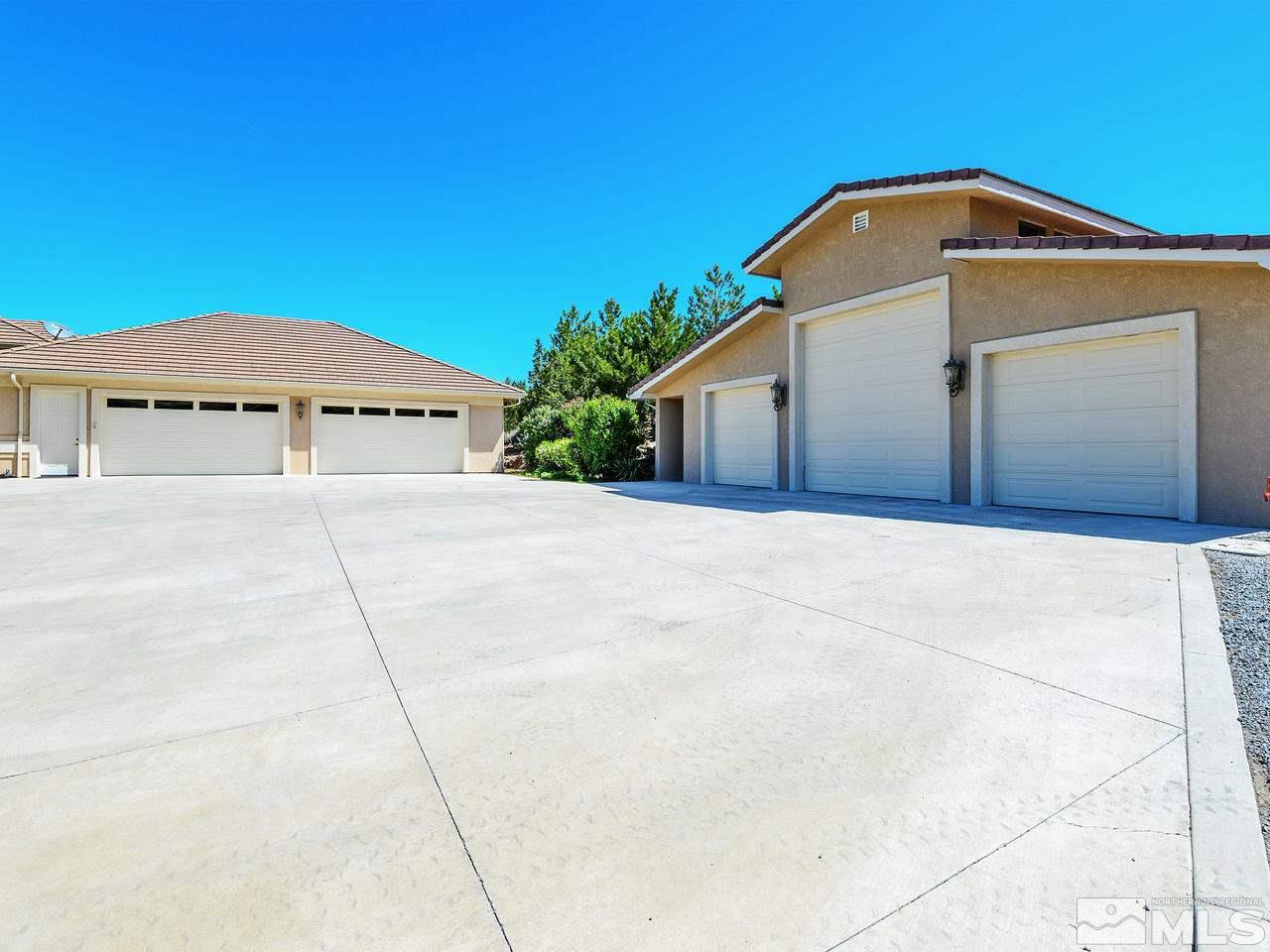 1180 Paddock Lane Reno, NV 89521 - Photo 17 of 25 a front view of a house with a yard