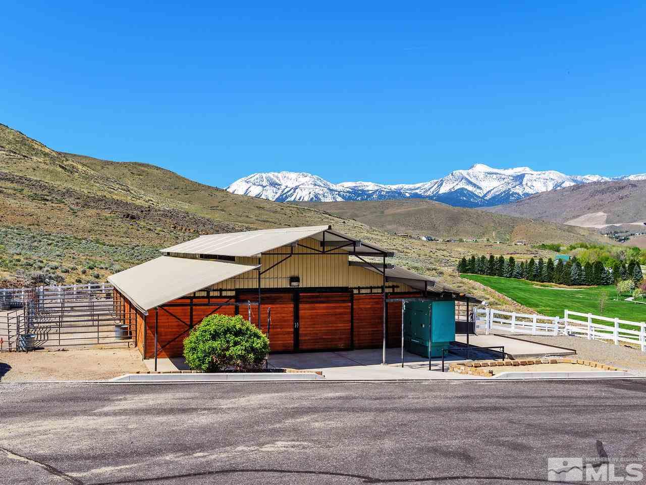 1180 Paddock Lane Reno, NV 89521 - Photo 18 of 25 a view of a house with a mountain view