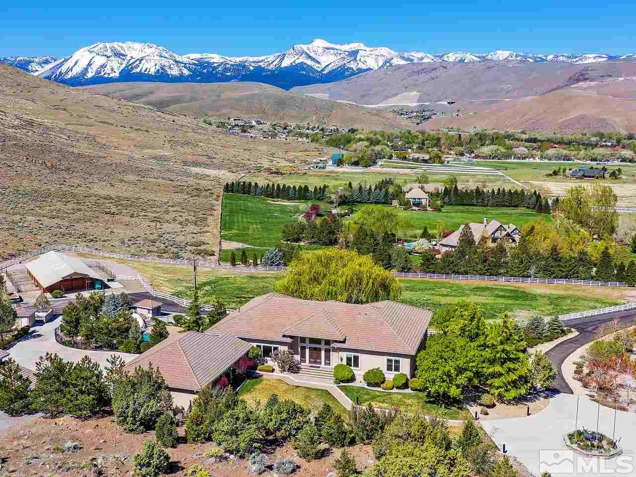 1180 Paddock Lane Reno, NV 89521 - Photo 3 of 25 an aerial view of a house with a garden