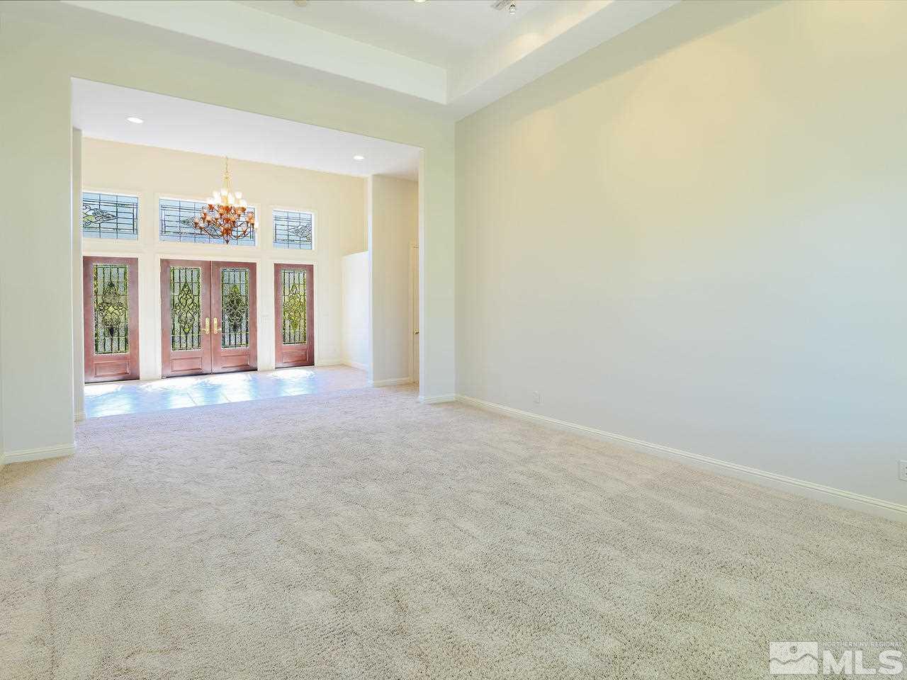 1180 Paddock Lane Reno, NV 89521 - Photo 4 of 25 an empty room with windows