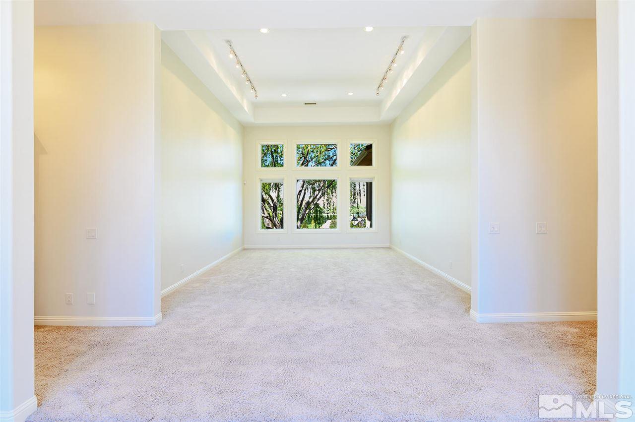 1180 Paddock Lane Reno, NV 89521 - Photo 5 of 25 an empty room with windows