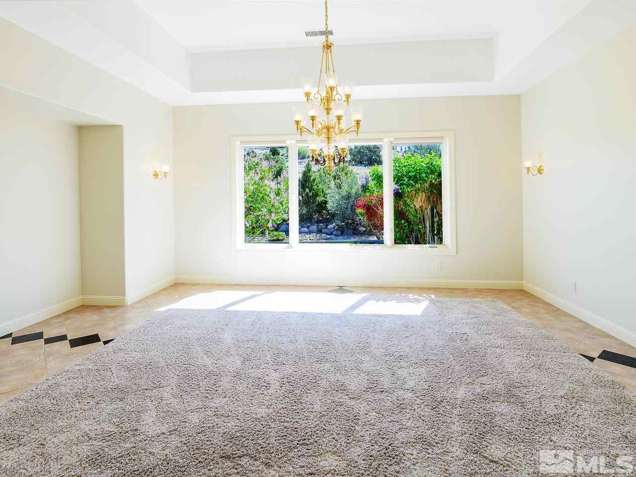 1180 Paddock Lane Reno, NV 89521 - Photo 6 of 25 a view of an empty room with a window