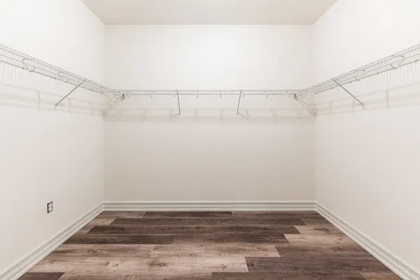 a view of an empty room with a fireplace