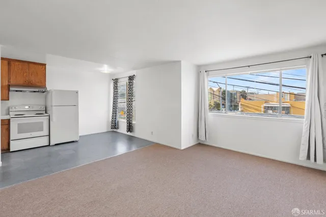 a view of a livingroom with furniture