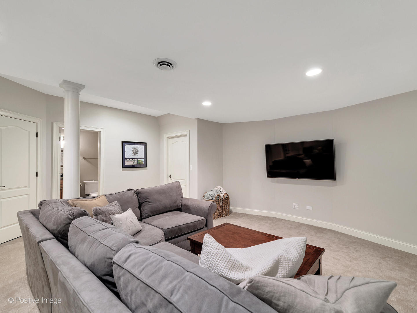308 North County Line Road Hinsdale, IL 60521 - Photo 34 of 40 a living room with furniture and a flat screen tv