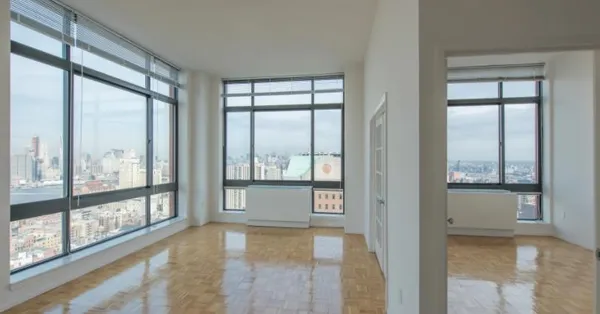 a view of an empty room and window