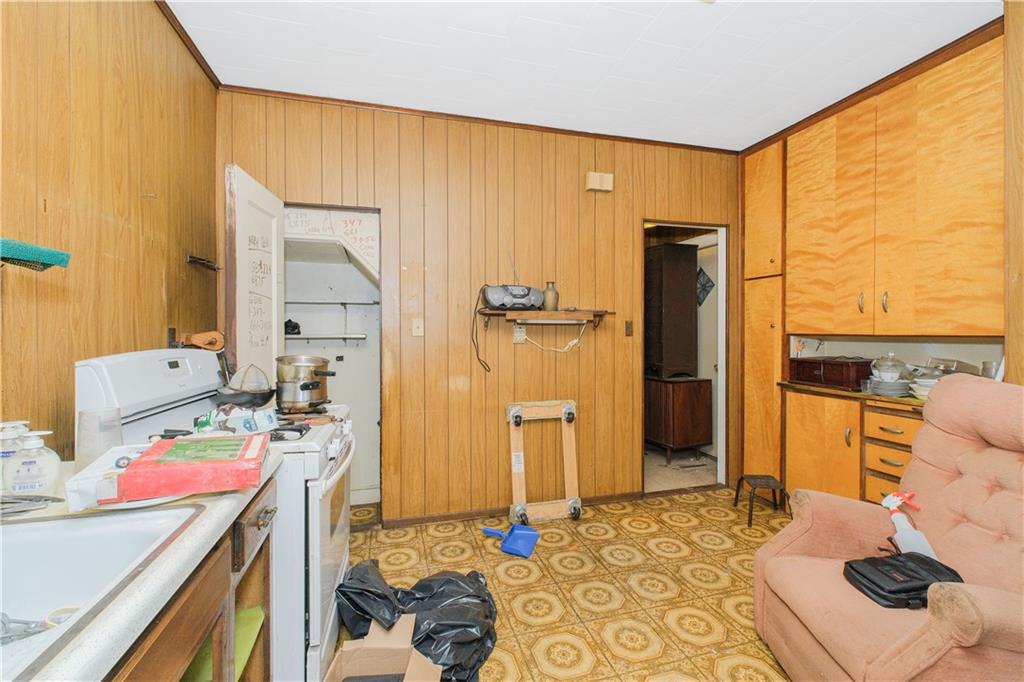 660 85th Street Brooklyn, NY 11228 - Photo 13 of 32 a room with storage and utility