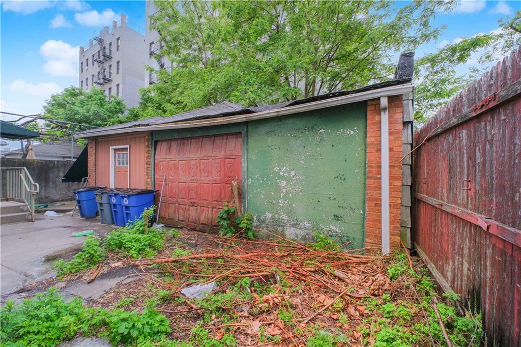 660 85th Street Brooklyn, NY 11228 - Photo 7 of 32 a backyard of a house with lots of green space