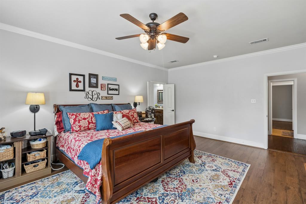 8104 Red Riv Run North Richland Hills, TX 76180 - Photo 15 of 38 a bed room with a bed and a couch