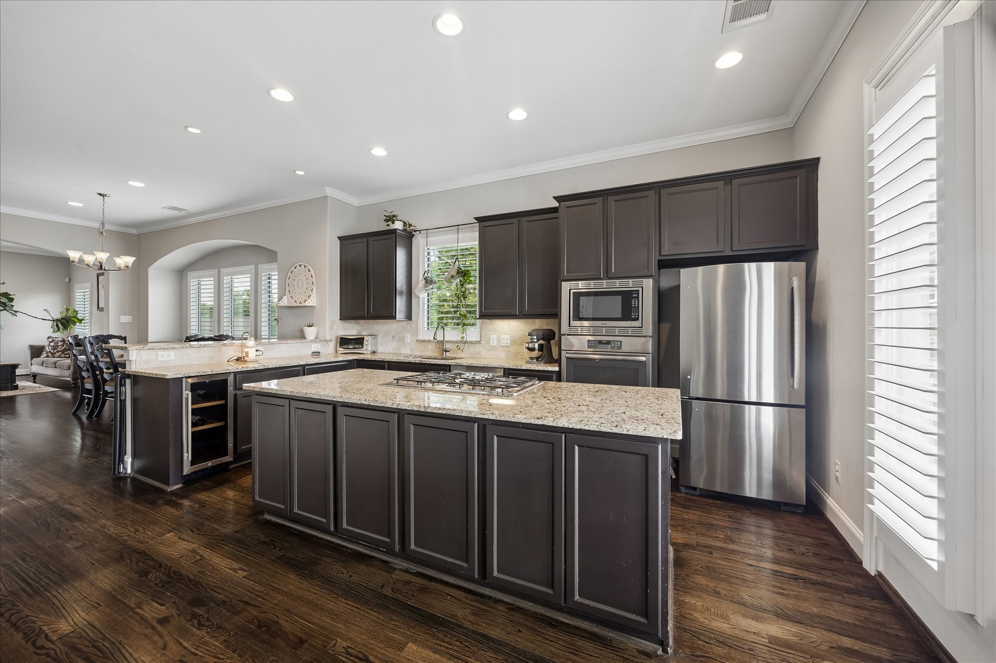 1915 Spring Street Houston, TX 77007 - Photo 6 of 40 The island kitchen has wood floors and stainless appliances
