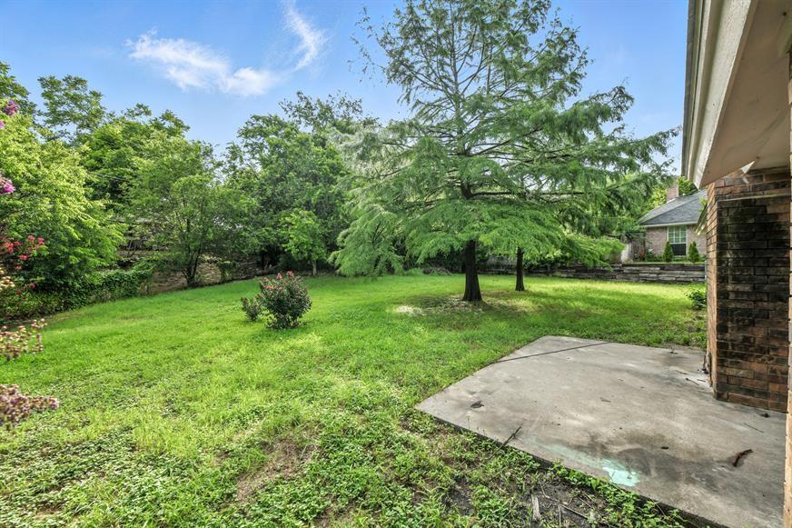 602 Valleyridge Court Decatur, TX 76234 - Photo 4 of 27 a view of a park with a tree