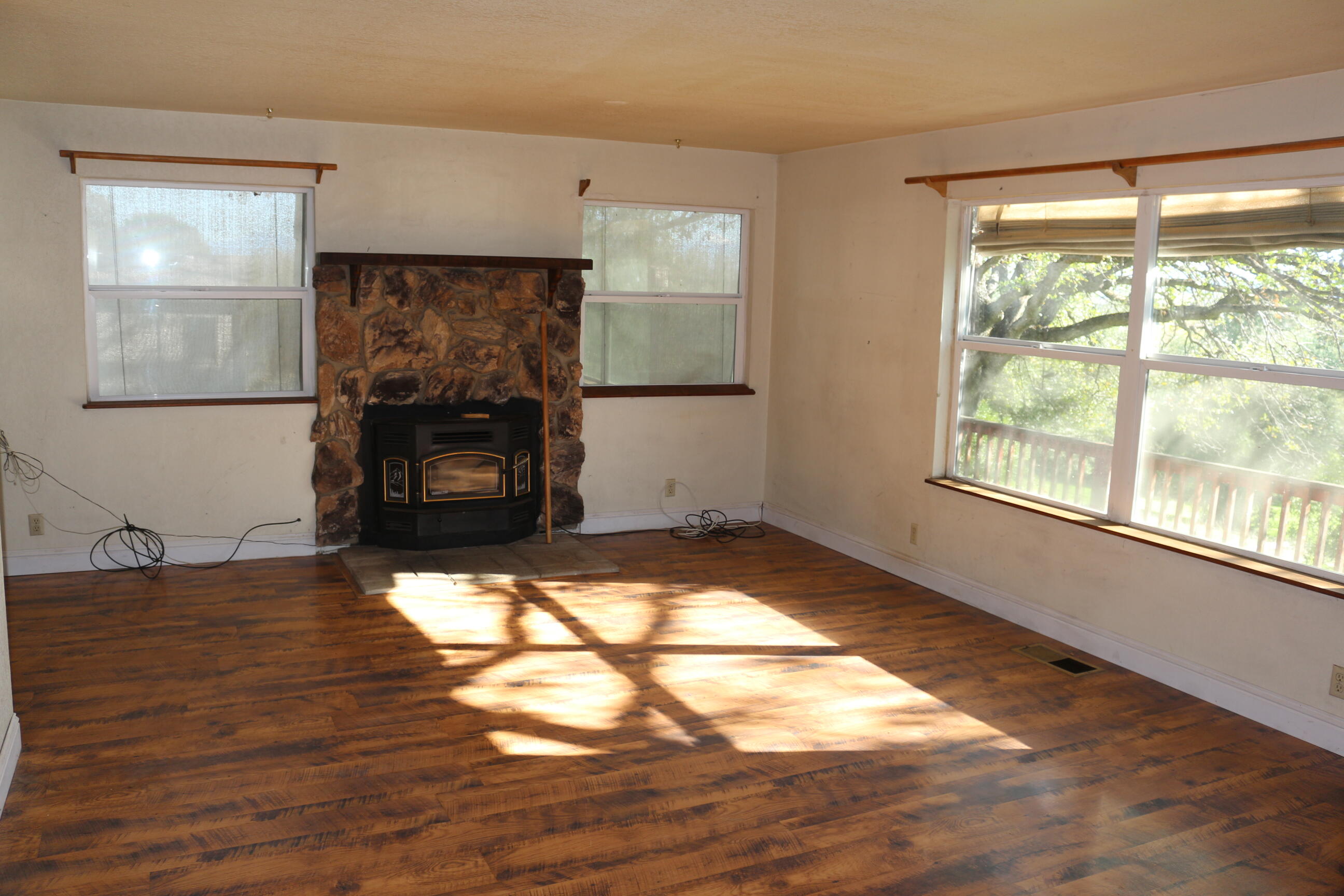 21754 Barnes Ranch Road Cottonwood, CA 96022 - Photo 6 of 42 Spacious Living Room, Pellet Stove