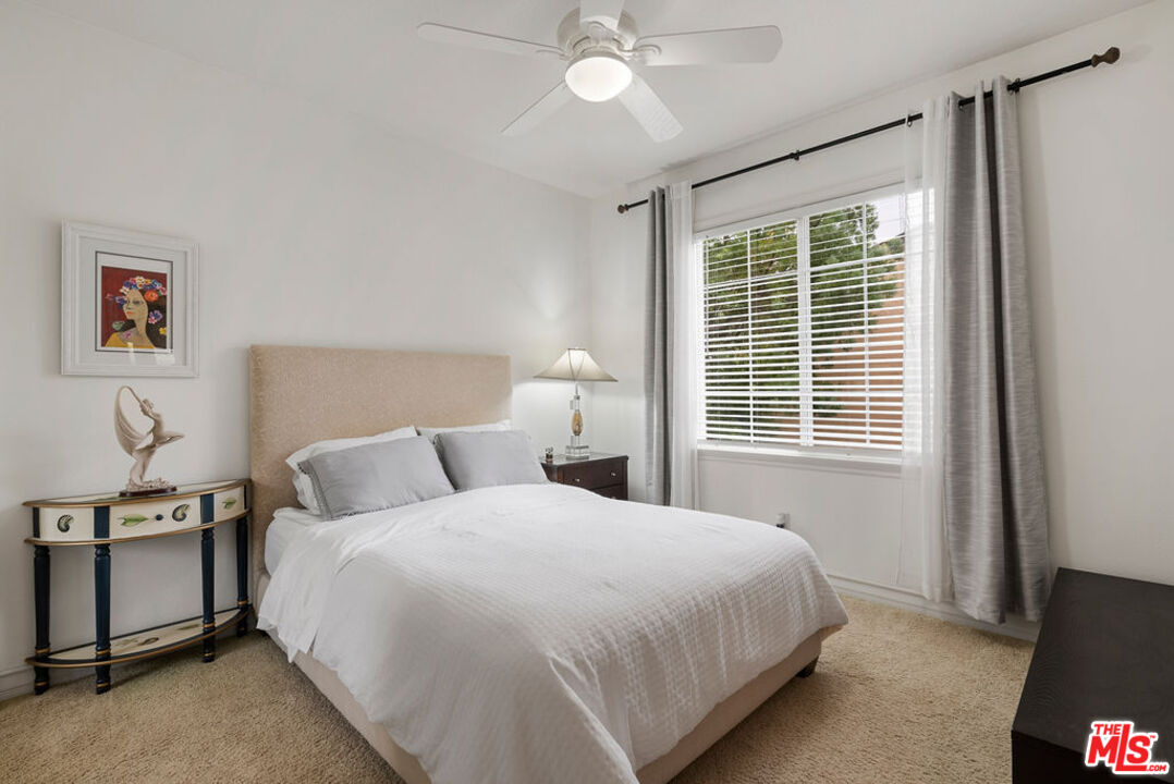 186 Laurel Ridge Drive Simi Valley, CA 93065 - Photo 50 of 60 a bedroom with a bed and a window