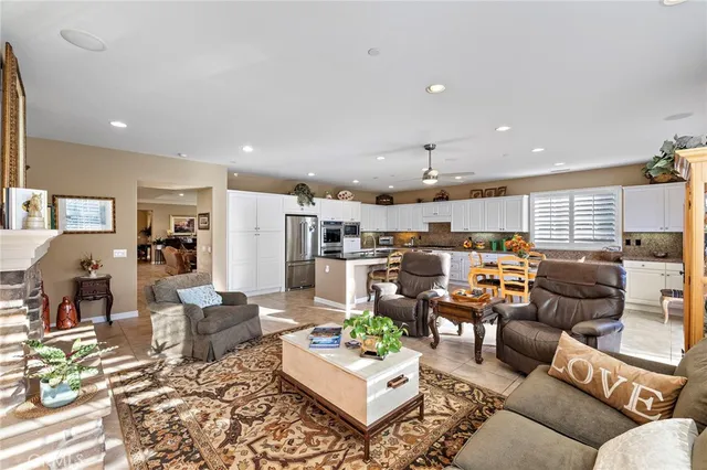 a kitchen with stainless steel appliances a refrigerator sink and cabinets