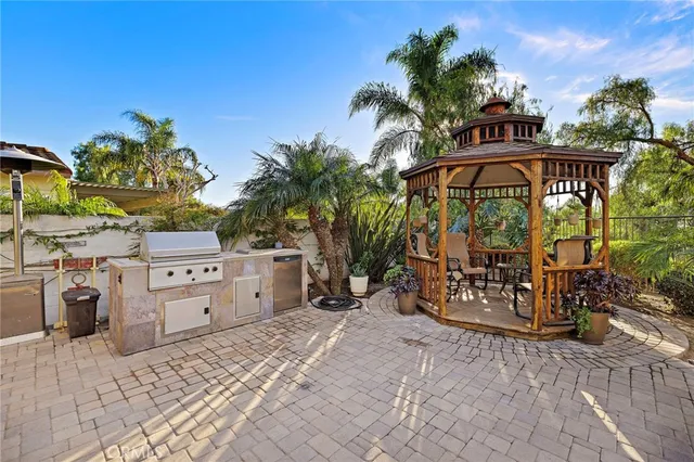 a utility room with sink dryer and washer