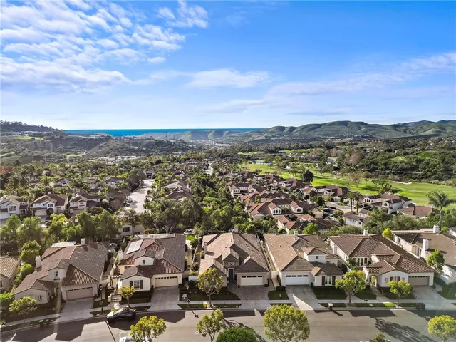 a view of a chairs and table in the patio