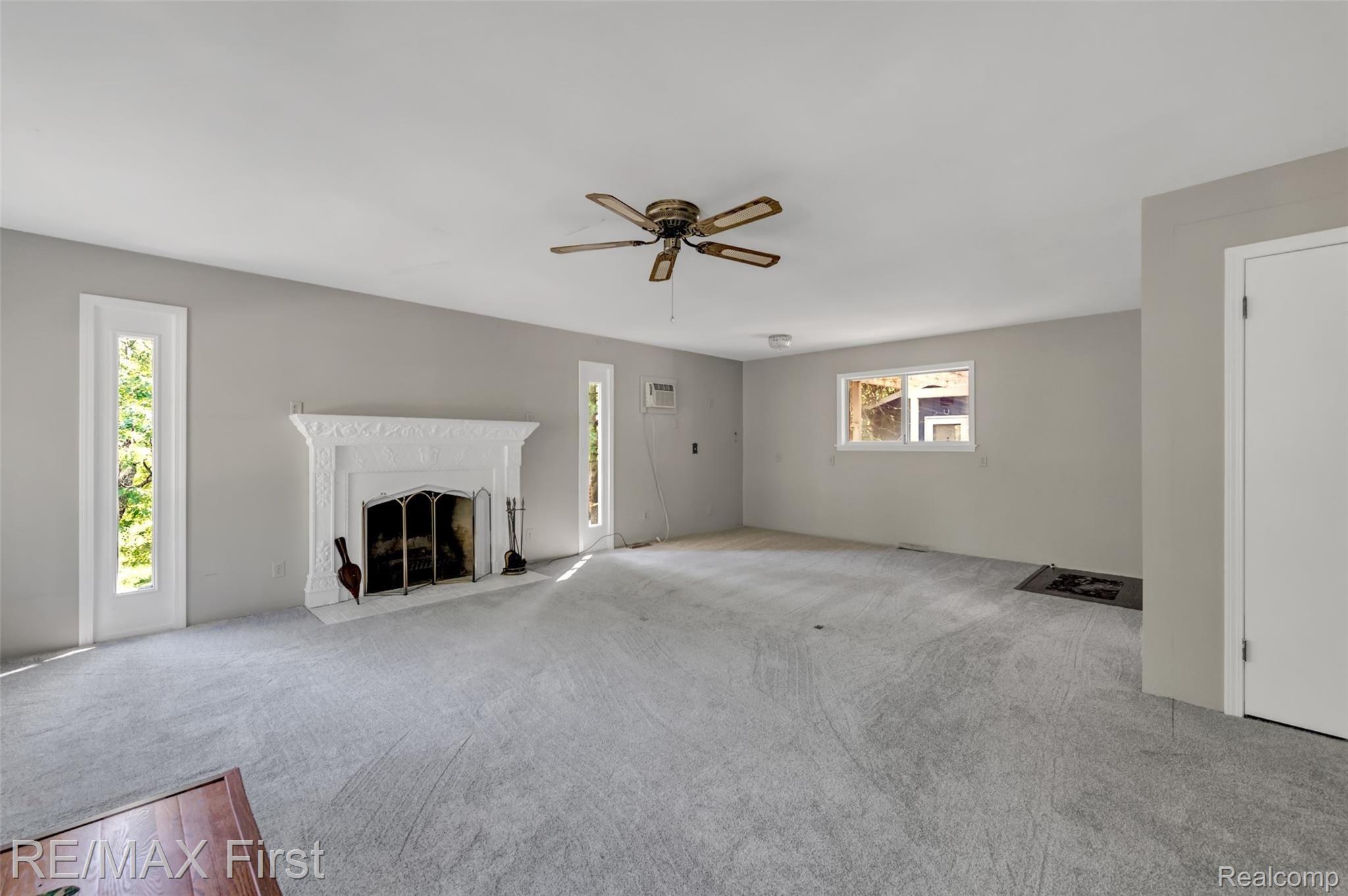 4521 Port Austin Road Caseville, MI 48725 - Photo 15 of 35 Living Room w/ natural FP