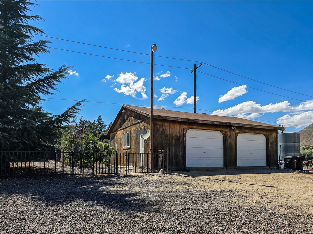 5363 Hess Road Phelan, CA 92371 - Photo 45 of 68 large garage area lots of parking