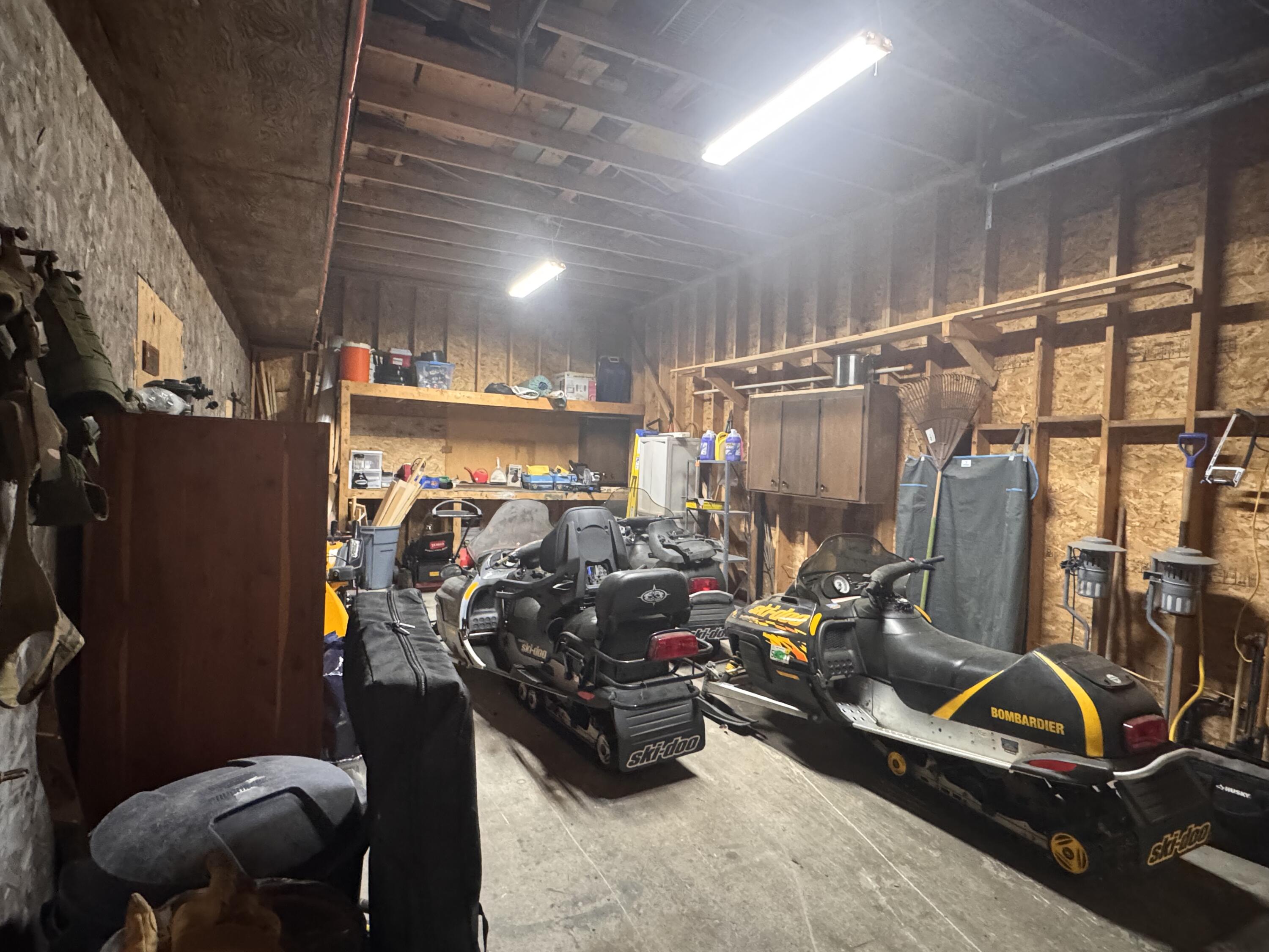 141 Parkman Road Wellington, ME 04942 - Photo 16 of 17 Single garage with high ceilings