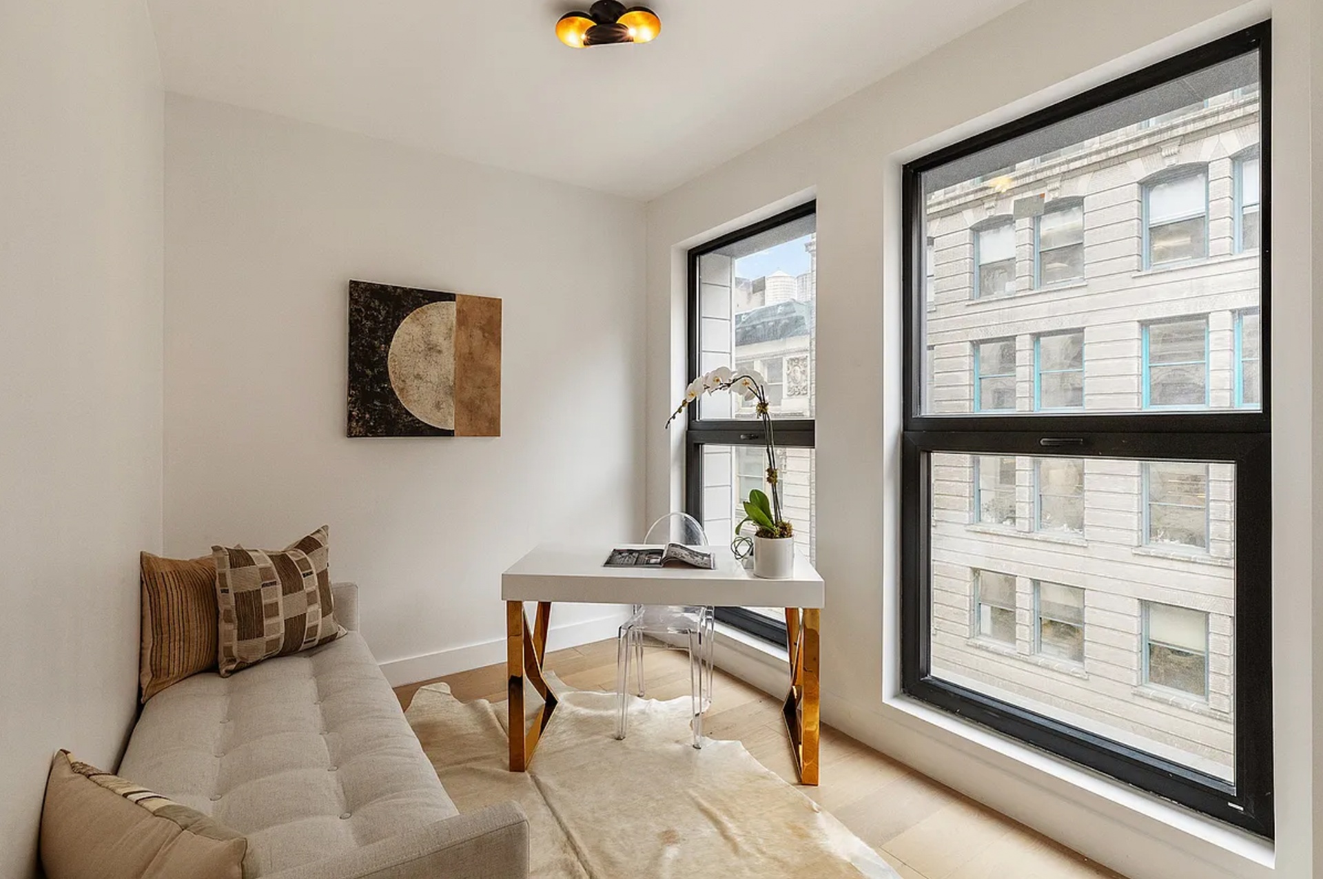21 West 17th Street, Unit 2 Manhattan, NY 10011 - Photo 7 of 18 a living room with furniture and a window