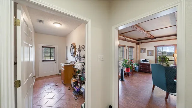 a view of entryway with livingroom and furniture