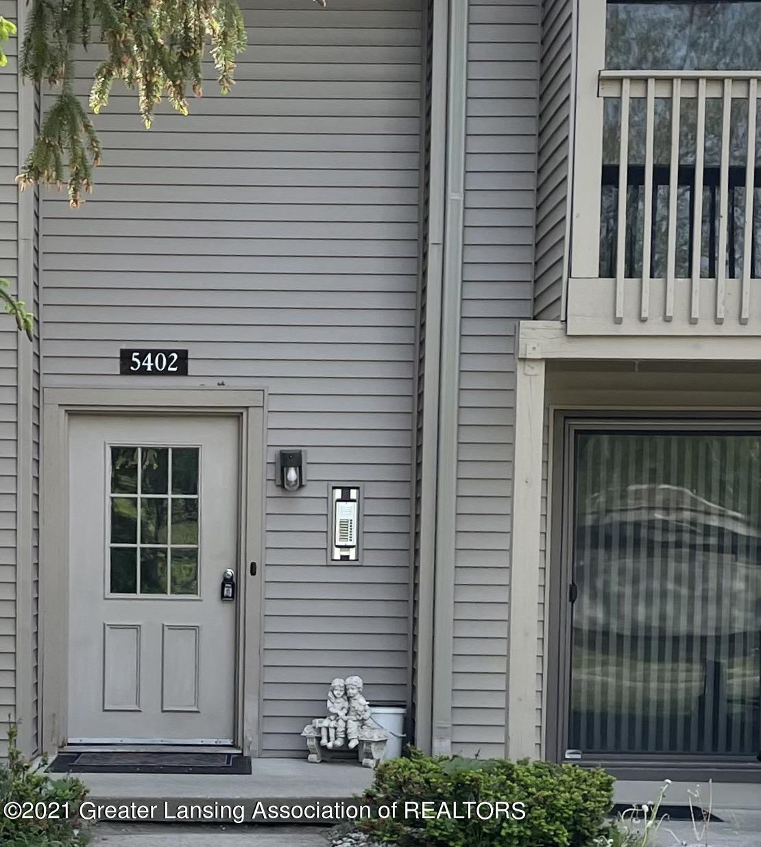 5402 Maple Ridge Road, Unit 6 Haslett, MI 48840 - Photo 2 of 21 Entrance