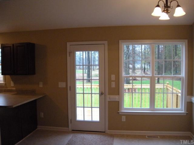 365 East Gordon Road Selma, NC 27576 - Photo 5 of 9 BREAKFAST ROOM WITH DECK OFF BACK