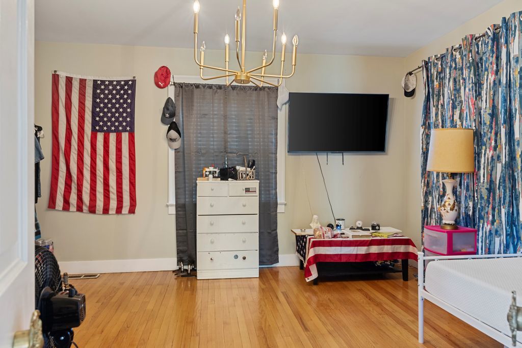 417 South Westlawn Avenue Decatur, IL 62522 - Photo 15 of 40 a room with furniture and a flat screen tv