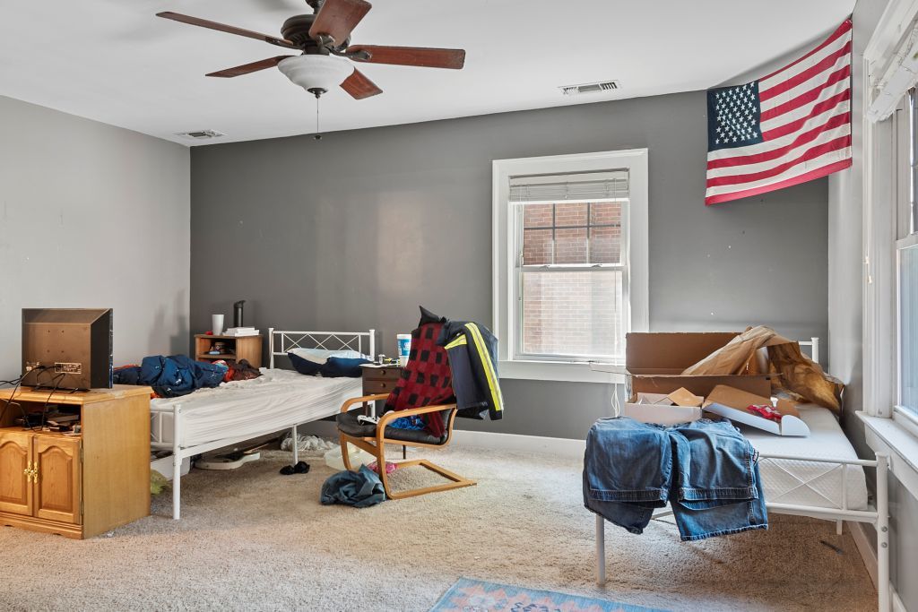 417 South Westlawn Avenue Decatur, IL 62522 - Photo 17 of 40 a bedroom with furniture and a window