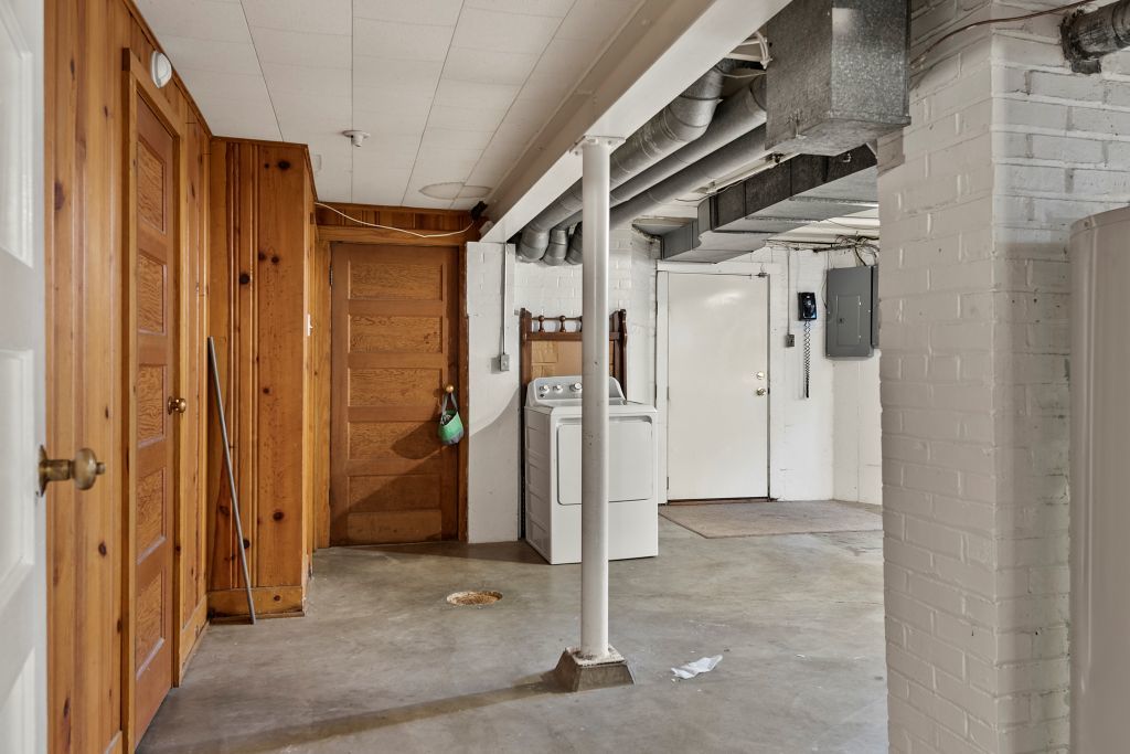 417 South Westlawn Avenue Decatur, IL 62522 - Photo 31 of 40 a view of a hallway with wooden shelves