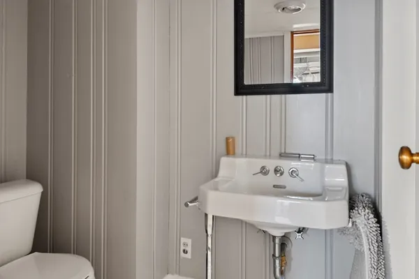 a bathroom with a sink and a toilet