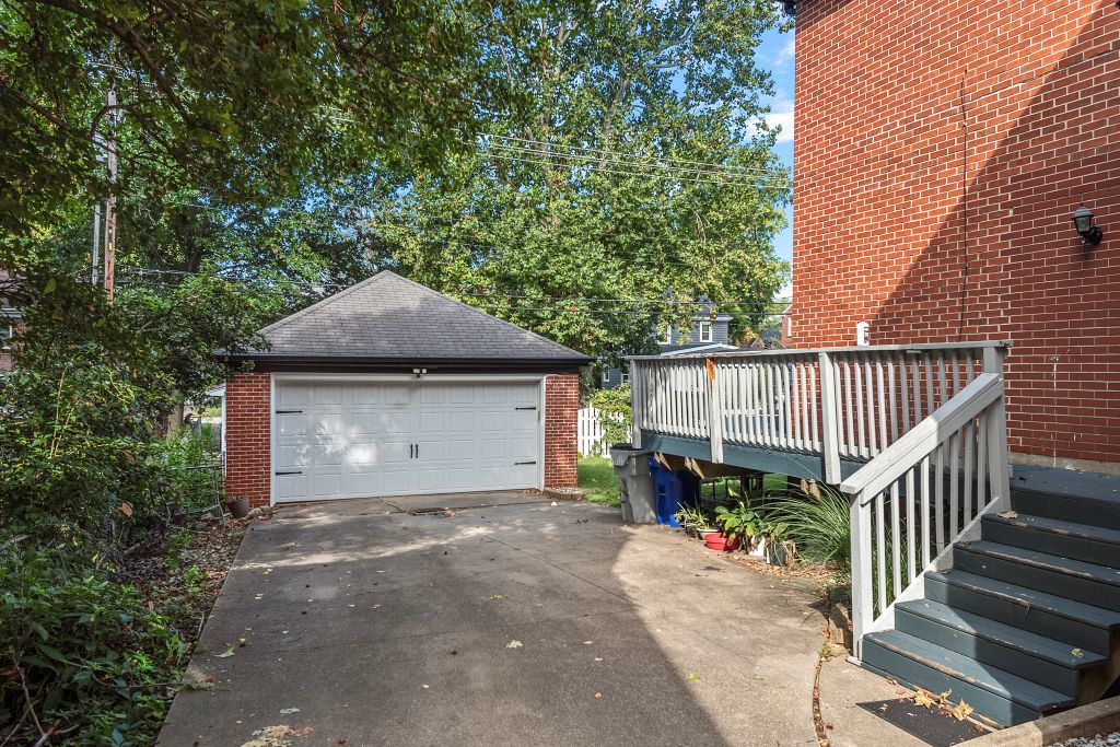 417 South Westlawn Avenue Decatur, IL 62522 - Photo 34 of 40 a view of a house with a small yard and wooden fence