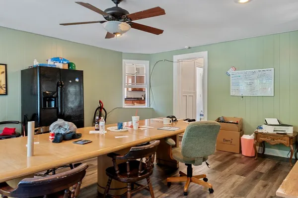 a view of a dining room with furniture