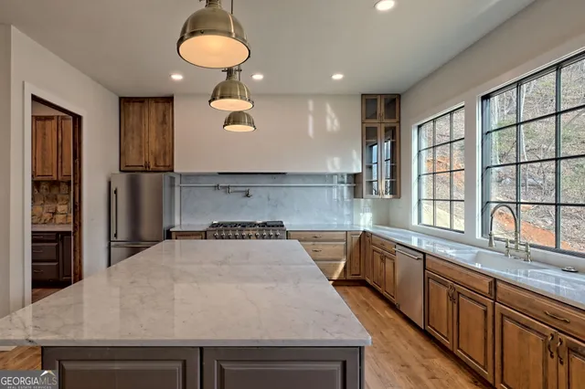 a spacious bathroom with a bathtub and window