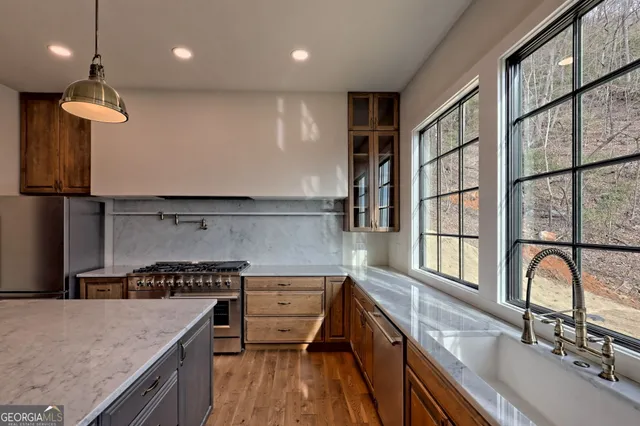 a bathroom with a double vanity sink and mirror