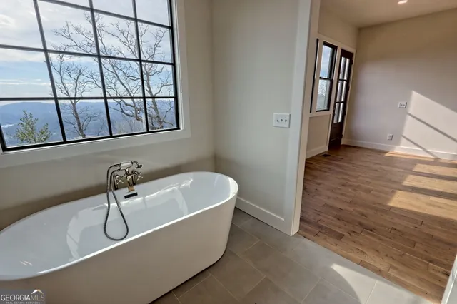 a view of an empty room and window