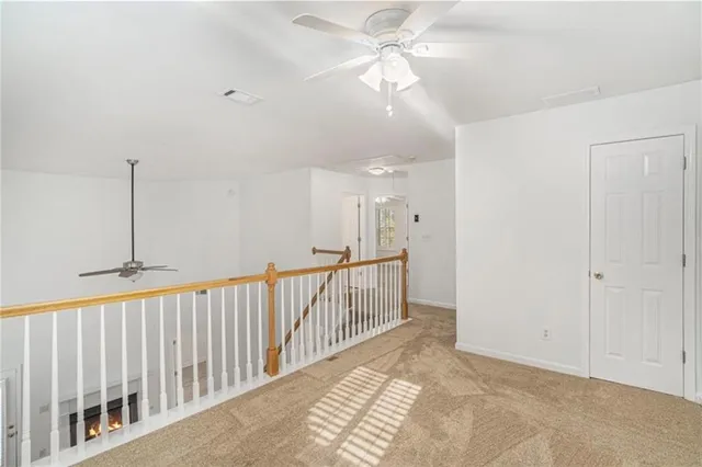 a view of a hallway with entryway