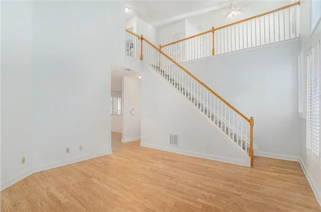 a view of a hallway with staircase