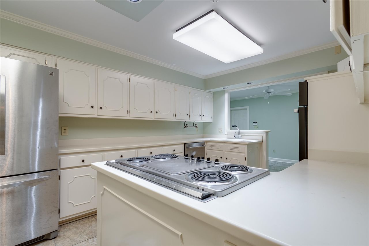 4515 Aldersgate Road, Unit 2 Memphis, TN 38117 - Photo 12 of 25 a stove top oven sitting inside of a kitchen