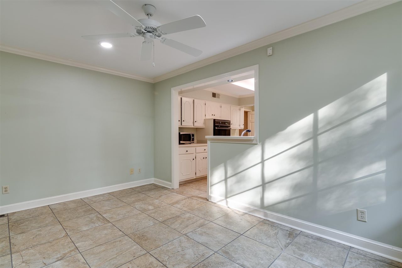 4515 Aldersgate Road, Unit 2 Memphis, TN 38117 - Photo 16 of 25 a view of a kitchen with furniture and an empty room