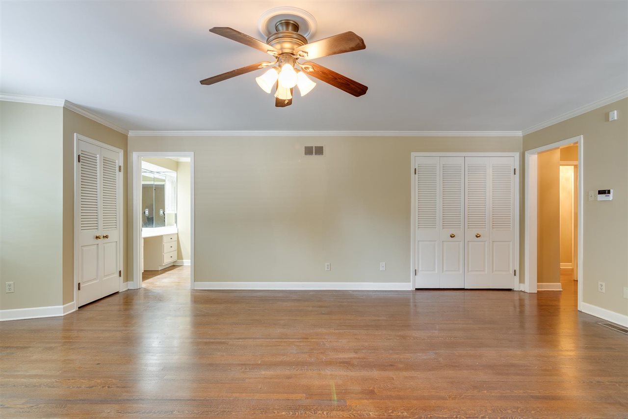 4515 Aldersgate Road, Unit 2 Memphis, TN 38117 - Photo 19 of 25 a view of an empty room with wooden floor