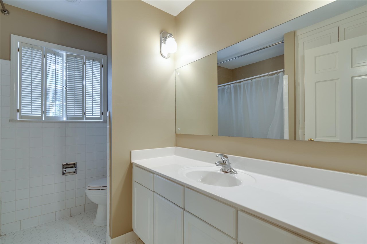 4515 Aldersgate Road, Unit 2 Memphis, TN 38117 - Photo 23 of 25 a bathroom with a sink and a toilet