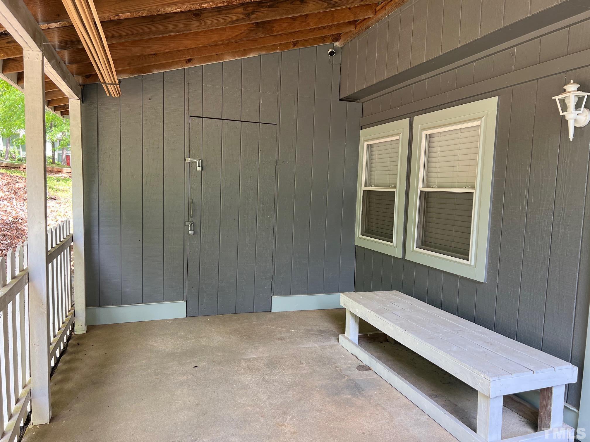 700 Godwin Court Raleigh, NC 27606 - Photo 18 of 20 a view of a room with a window and brick walls
