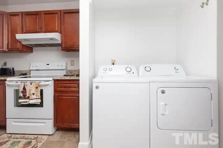 700 Godwin Court Raleigh, NC 27606 - Photo 8 of 20 a utility room with dryer and washer