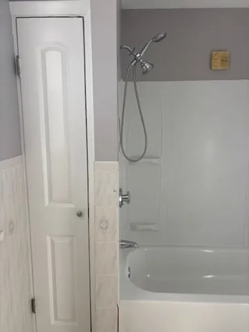 a close view of a bathtub in bathroom
