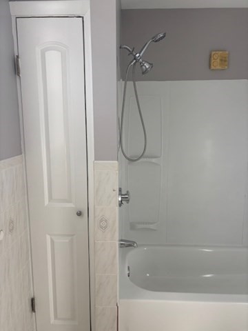 193 Snell Street, Unit 2 Fall River, MA 02721 - Photo 16 of 19 a close view of a bathtub in bathroom