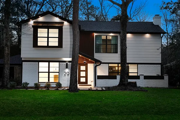 front view of a house with a yard