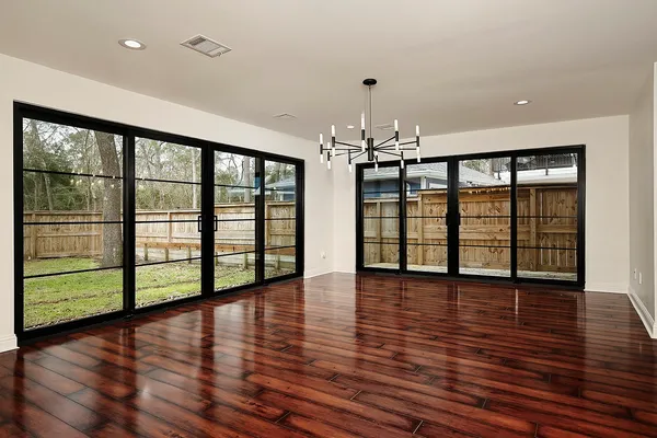 an empty room with windows