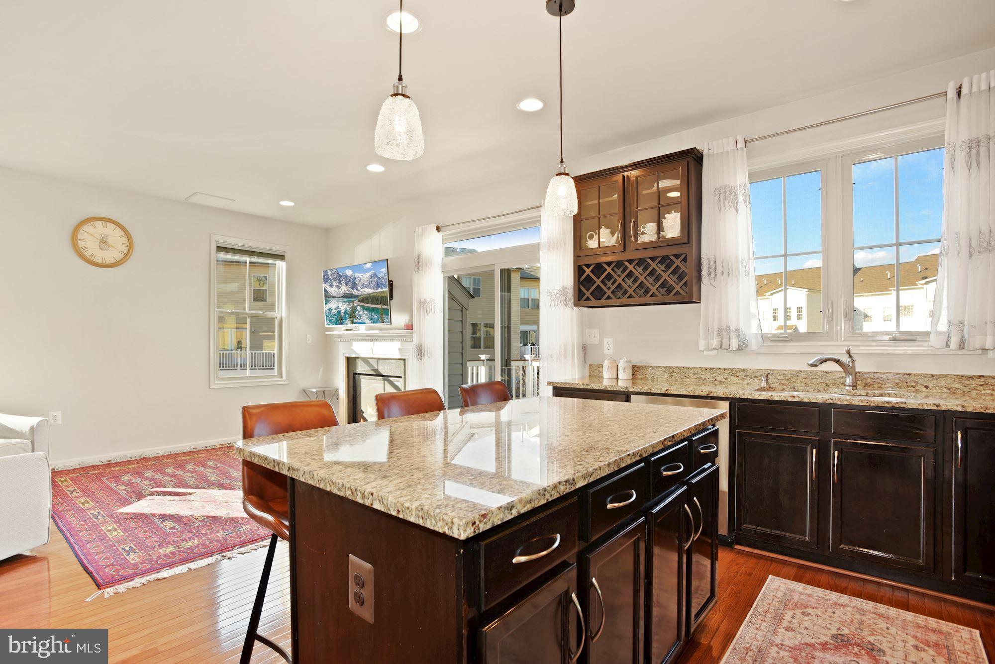 42186 Castle Ridge Square Brambleton, VA 20148 - Photo 15 of 37 Gorgeous kitchen w/ island & granite counters!